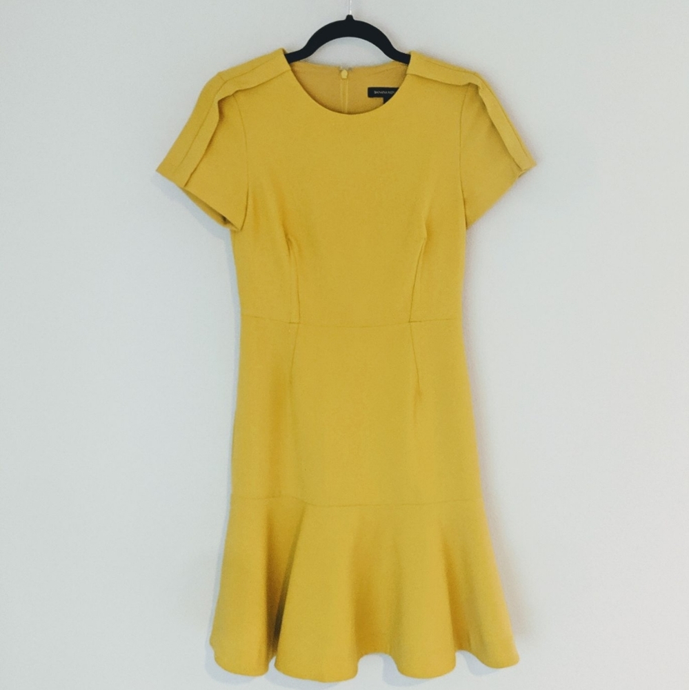 Classy structured dress with flowy hem